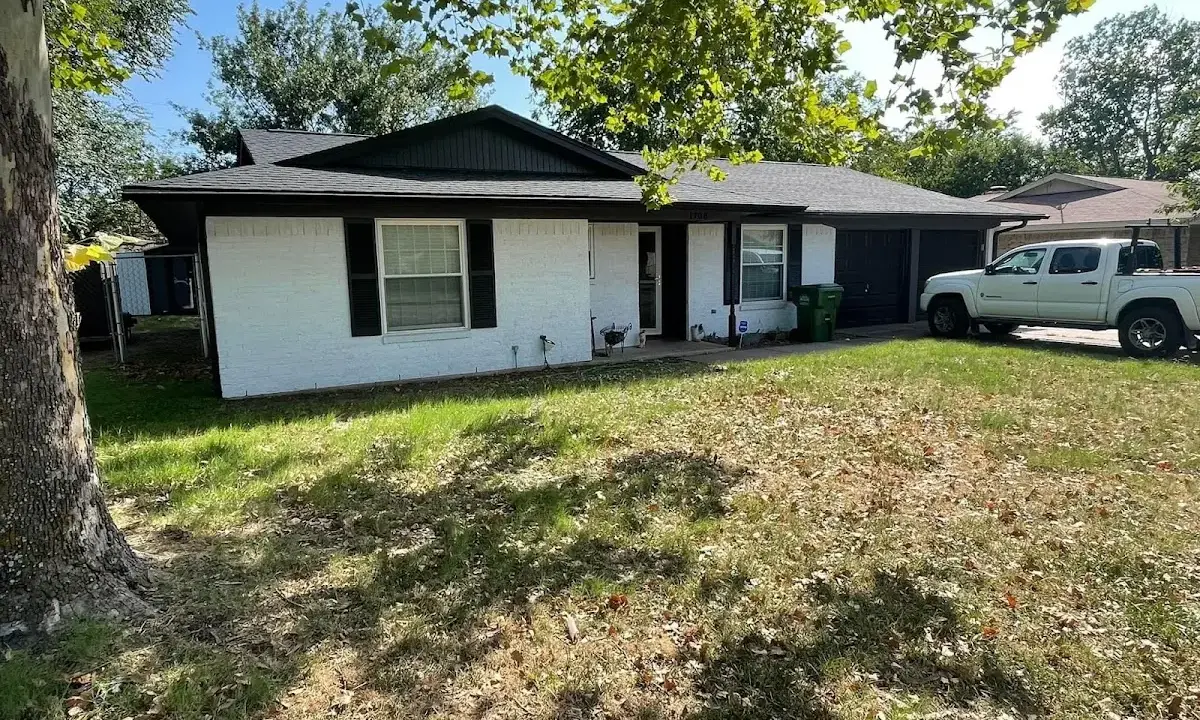 Professional roofing crew working on a residential roof in Winthrop Harbor